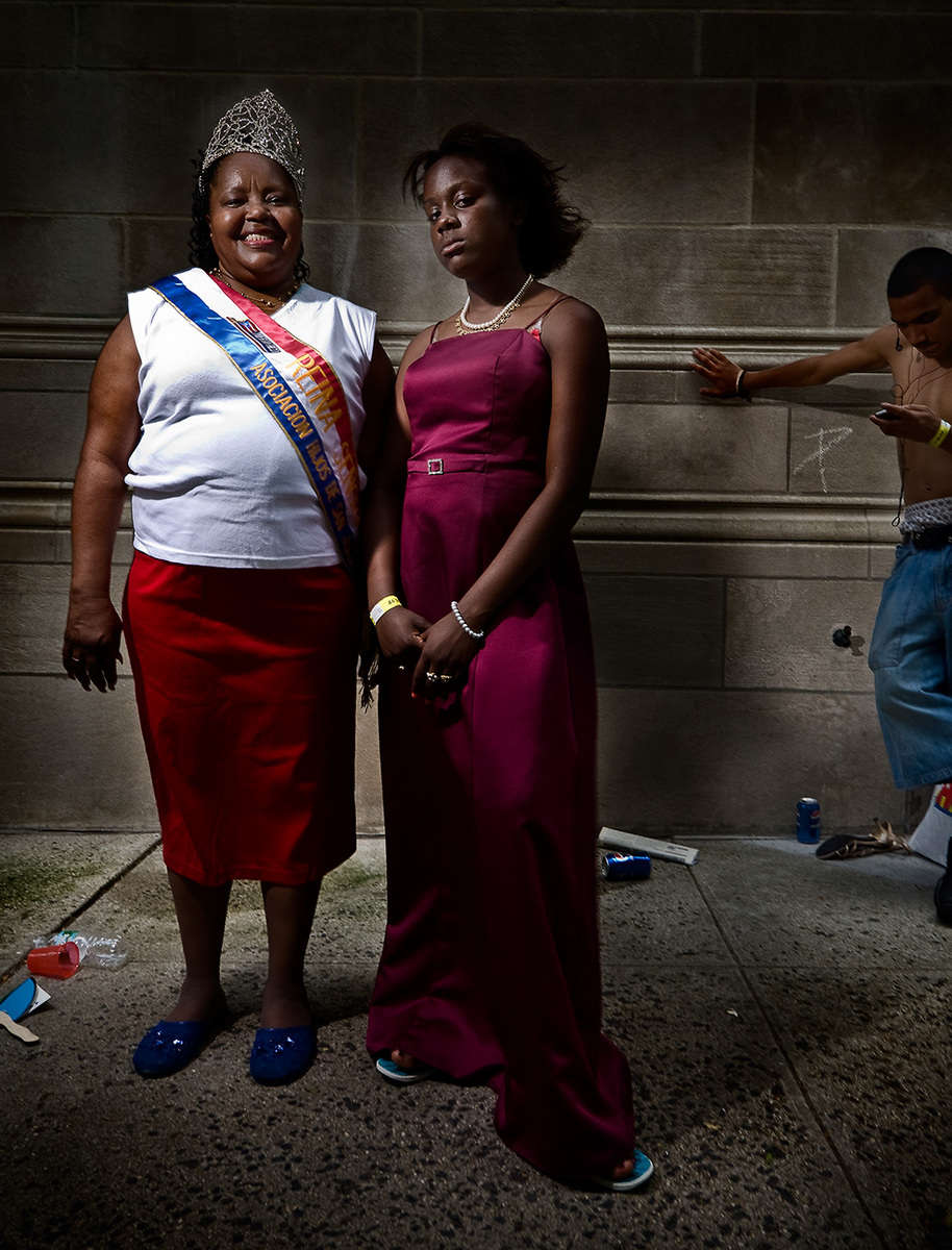 Mother and Daughter at theNational Puerto Rican Day Parade, NYC .. photographed between Fifth Avenue and Madison Avenue on the Upper Eastside, NYC. : Portraits : New York City portrait photographer