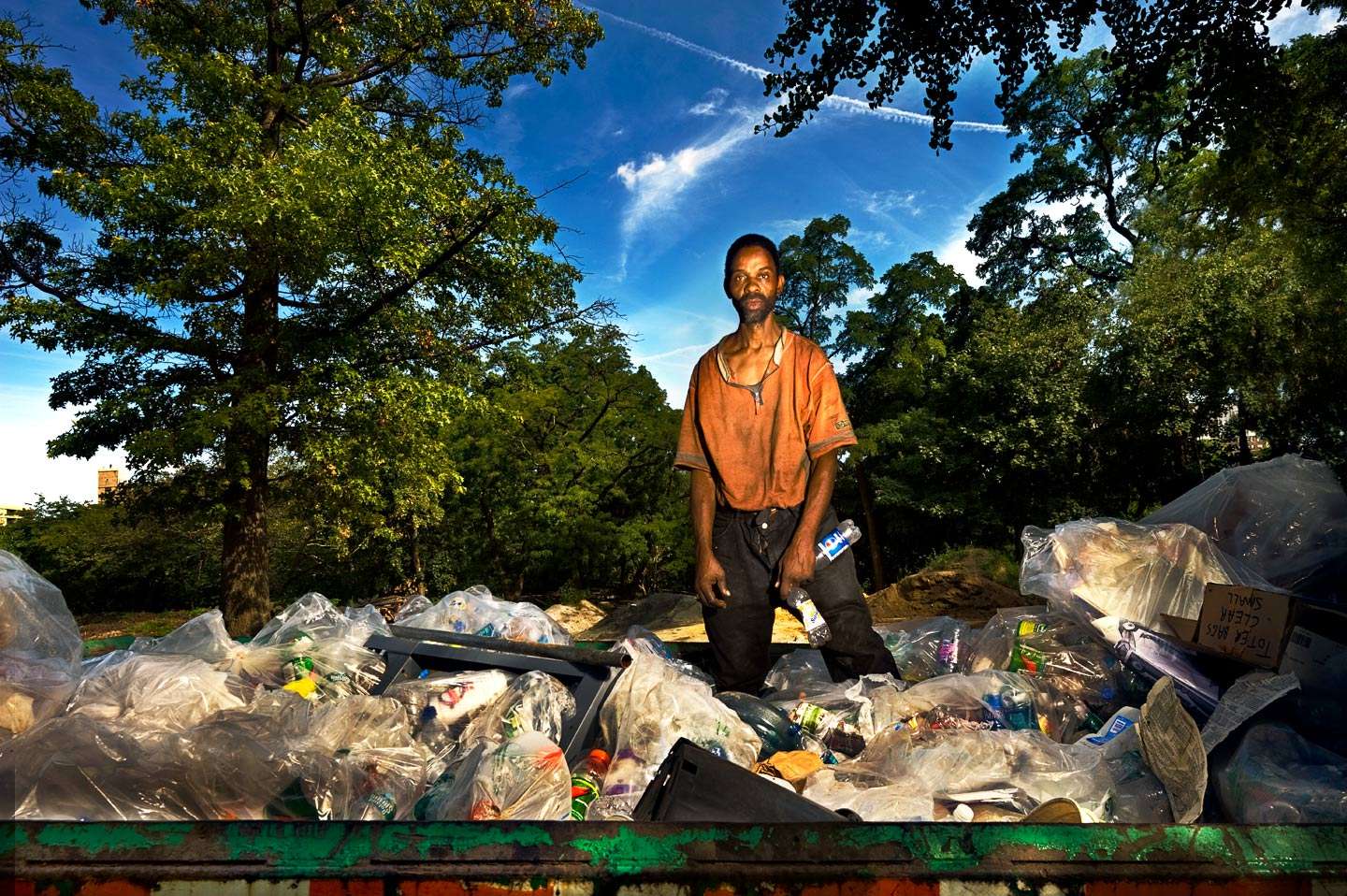 Ernest Phillips earning money in America by collecting bottles from the trash in Central Park, NYC : On The Road : New York City based photographer and video specializing in portrait corporate portraits, video, editorial stories for on location and architectural photography