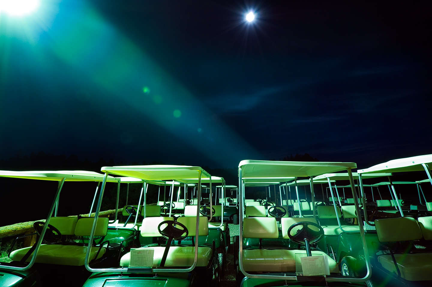 Moon, street lamp and  golf carts in South Dakota.  Available for stock. : On The Road : New York City based photographer and video specializing in portrait corporate portraits, video, editorial stories for on location and architectural photography