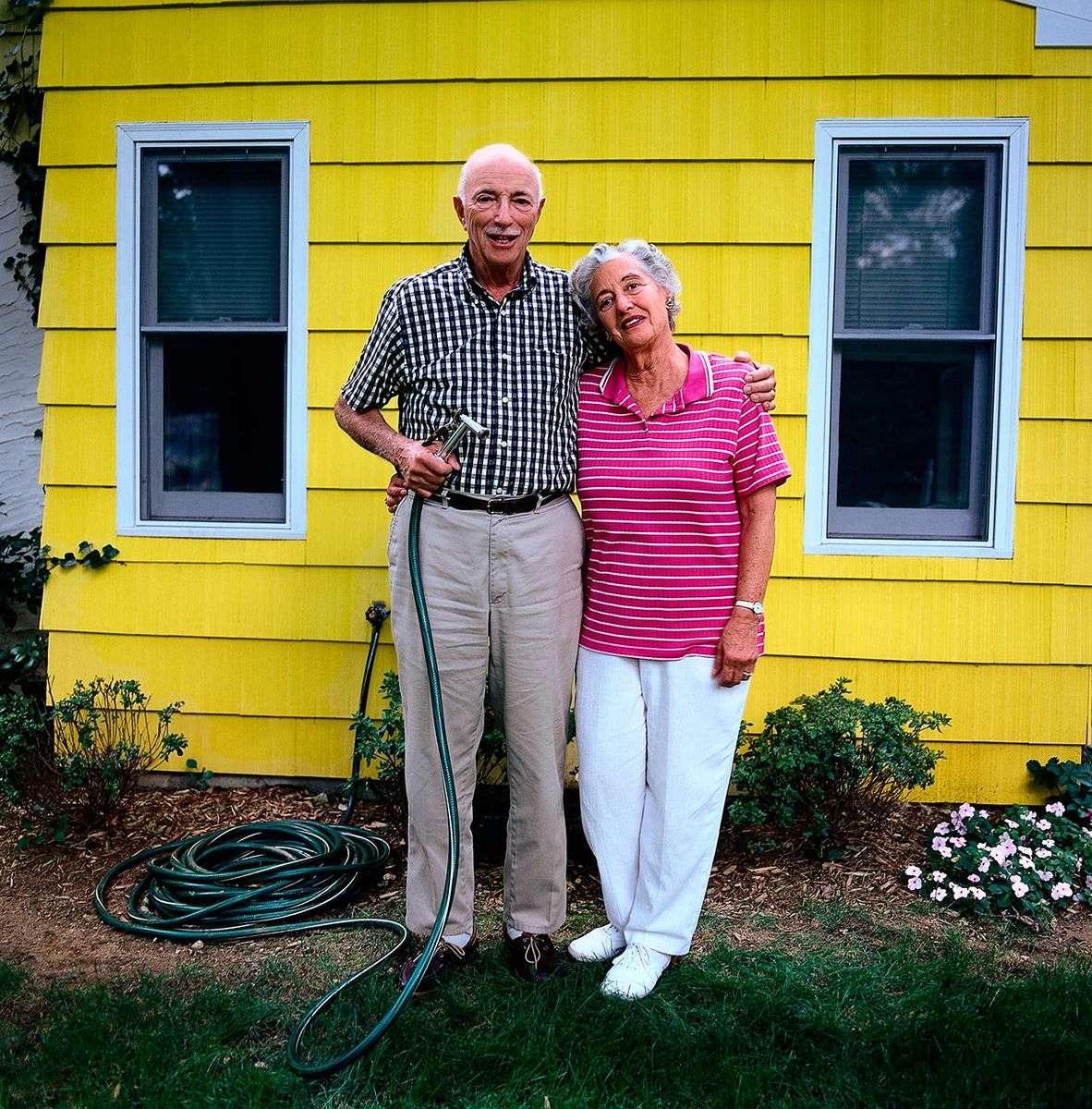 Seniors at home on retirement enjoying a good life, gardening and relaxing - available for stock.