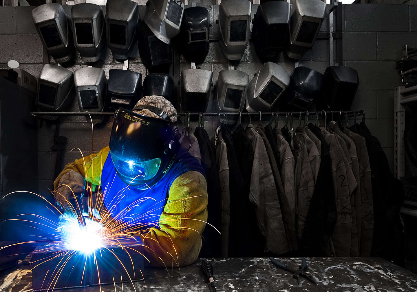 Welder at sheet metal factory : On The Road : New York City portrait photographer