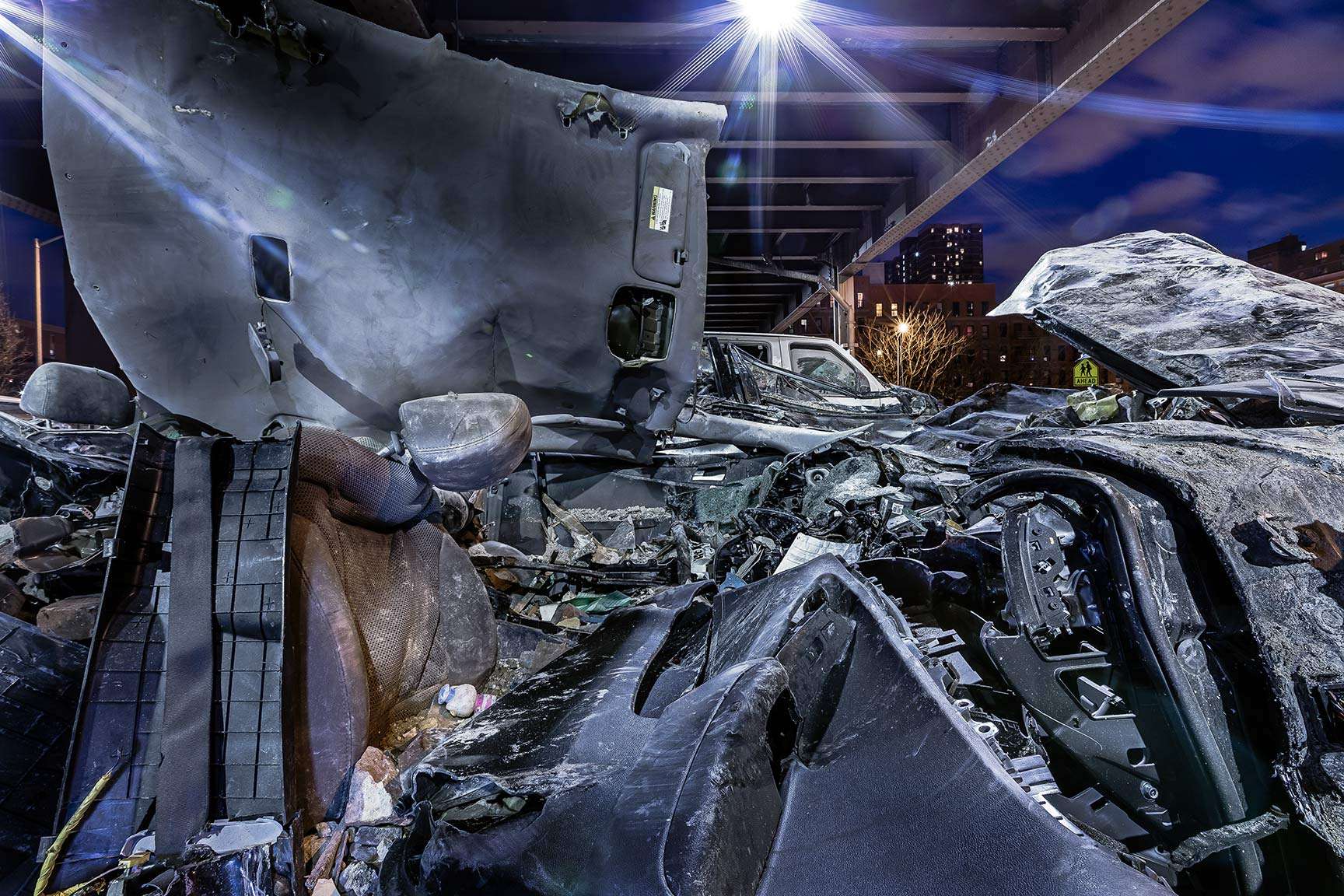 Concrete Landscapes a personal series re-examining what is meant by Landscape Photography.. the intersection of nature and man in an urban environment.  Car damaged from a building explosion in Harlem, NYC. : Concrete Landscapes : New York City portrait photographer