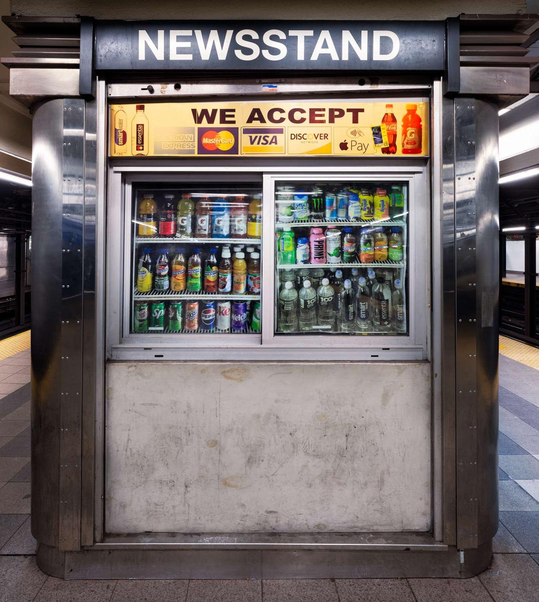 Newsstand located on the 34th street subway station in New York City. Once a valuable quick pick-up for newspapers and magazines. Now, they service mostly snacks and drinks. Will there be newsstands on the internet?