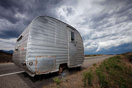 Route 284 in Colorado - a trailer just sitting there abandoned in the middle between there and here.