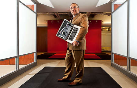 Avaya CEO Kevin Kennedy for Forbes Magazine--- laptop is featuring one of the Avaya products.