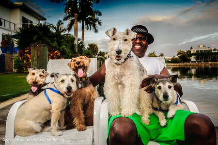 Marco Island Florida portrait of owner with dogs at waterfront property 