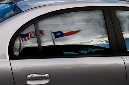 Texas and the USA flags a symbol of how we can reduce our addiction to petroleum here at home. Texas has been doing this for years.